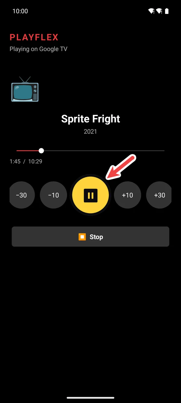 The phone remote with the pause button highlighted